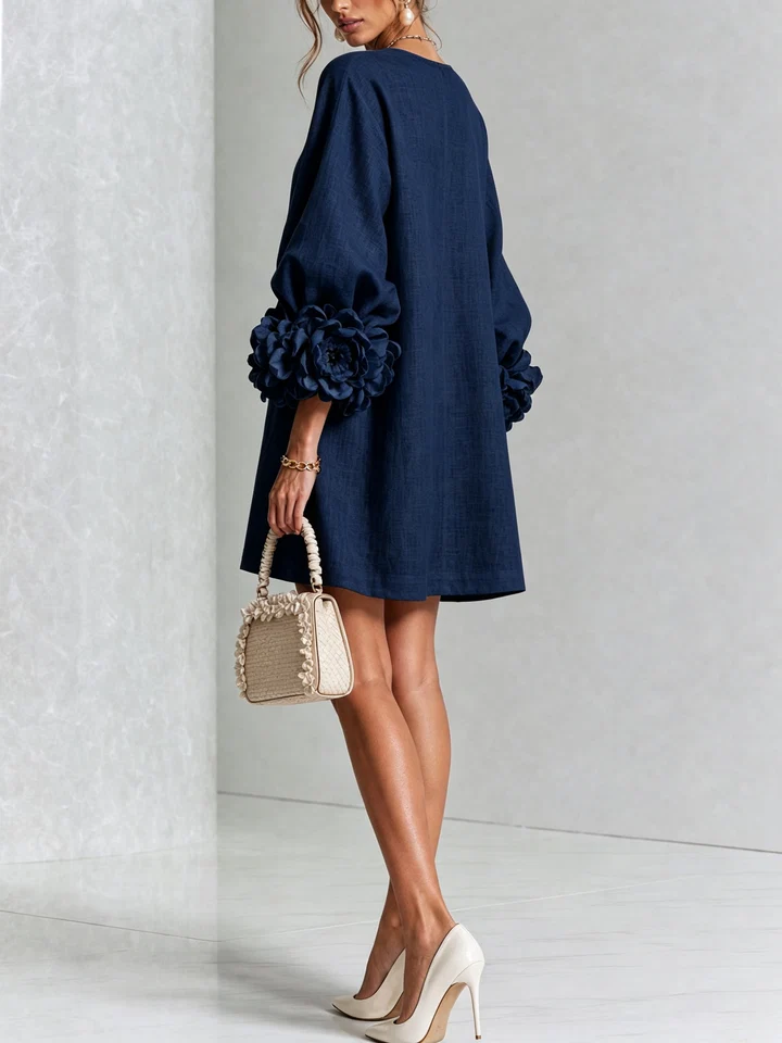 LOLA | MINIVESTIDO CON ESTAMPADO FLORAL Y CIERRE DE BOTONES