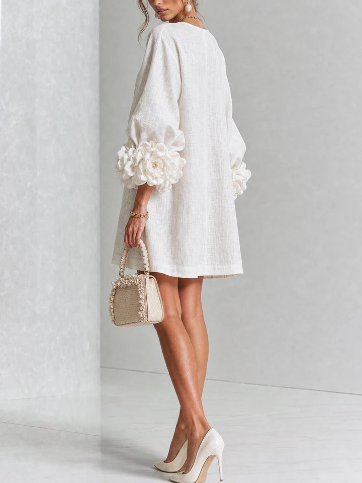 LOLA | MINIVESTIDO CON ESTAMPADO FLORAL Y CIERRE DE BOTONES