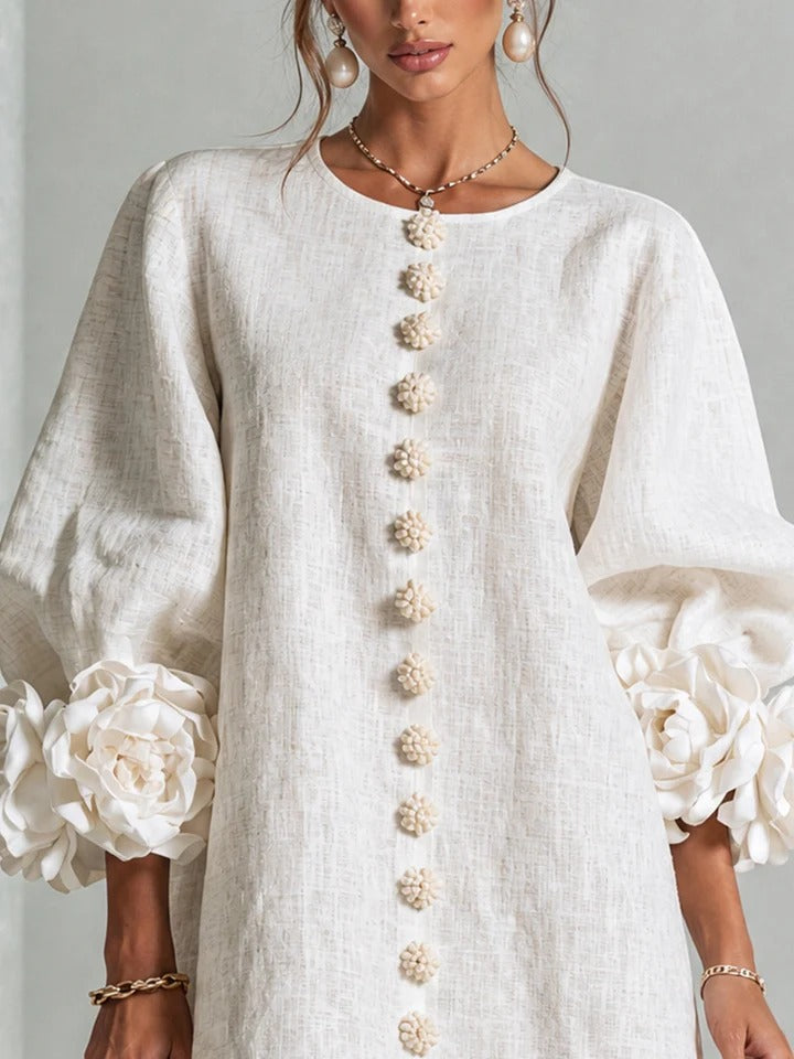 LOLA | MINIVESTIDO CON ESTAMPADO FLORAL Y CIERRE DE BOTONES
