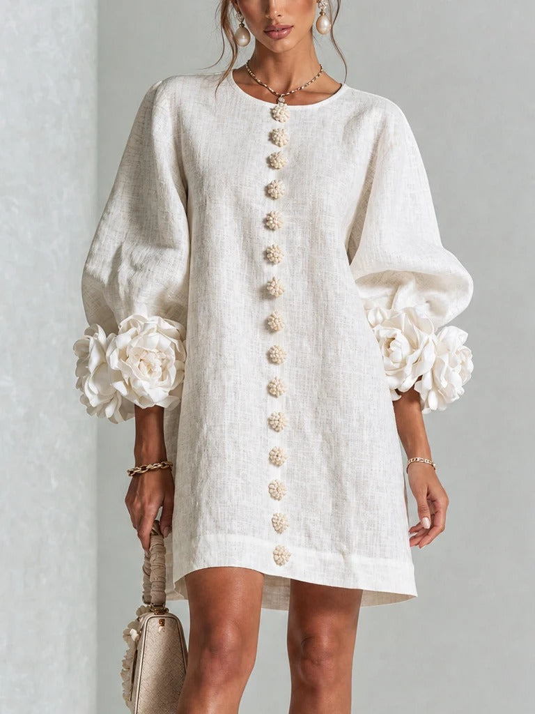 LOLA | MINIVESTIDO CON ESTAMPADO FLORAL Y CIERRE DE BOTONES
