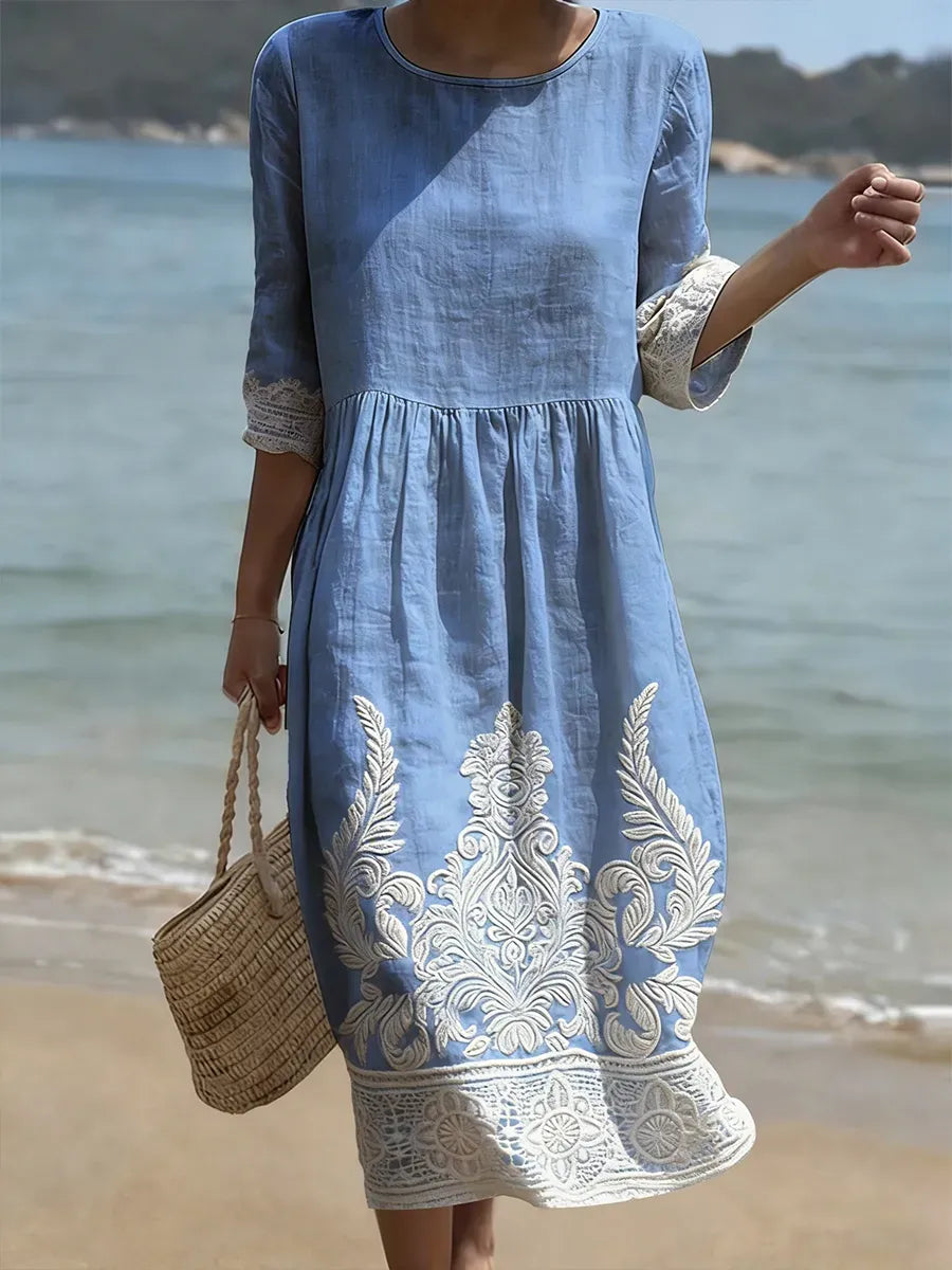 SILVIA · Vestido midi con bordado floral y mangas tres cuartos